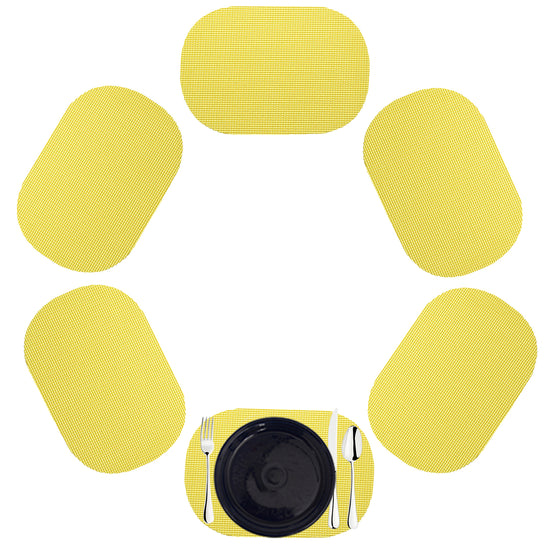 Lemon | Oval fishnet placemat set of 6 in a sunny yellow color.